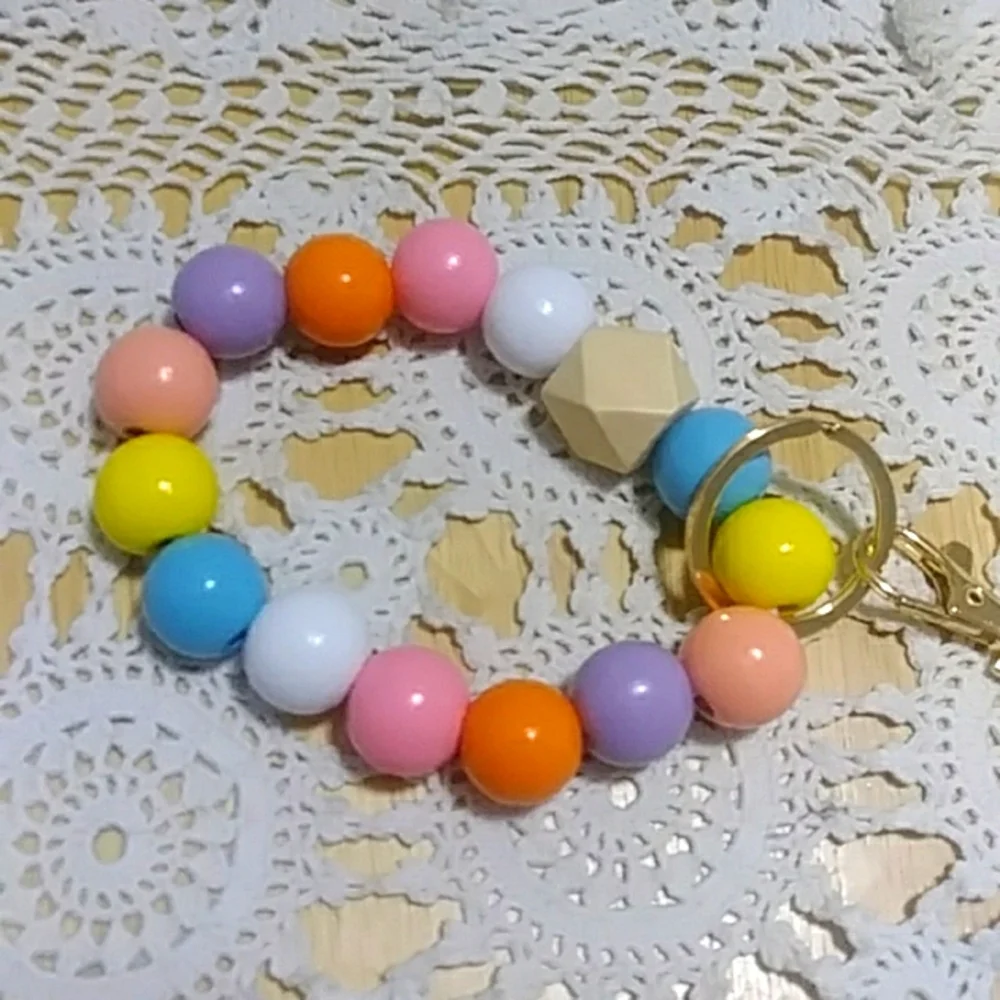 Cute clunky stretch bracelet keyring with tassel
